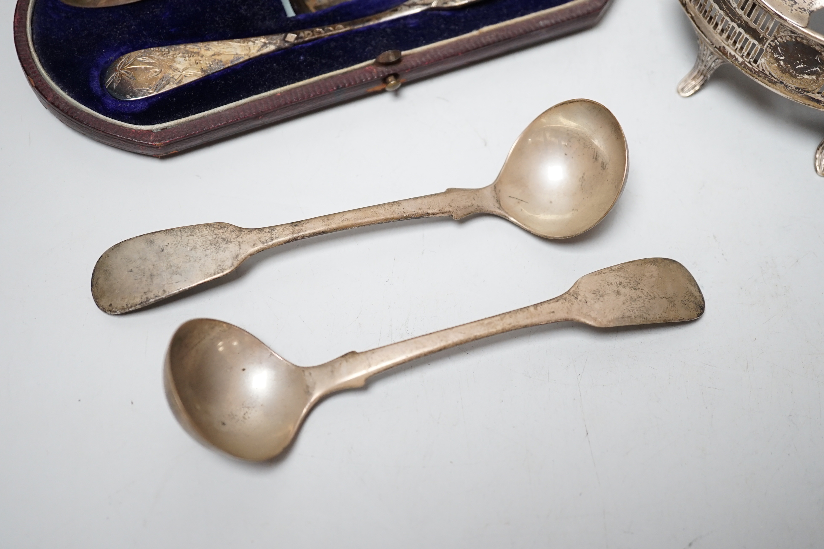 A cased Victorian silver christening trio, Martin, Hall & Co, London & Sheffield, 1881, a pair of William IV silver fiddle pattern sauce ladles, London, 1836 and a late silver mustard, lacking liner.